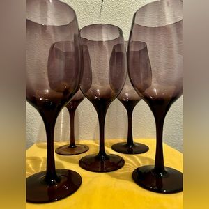 Set of 5 purple prism wine glasses.